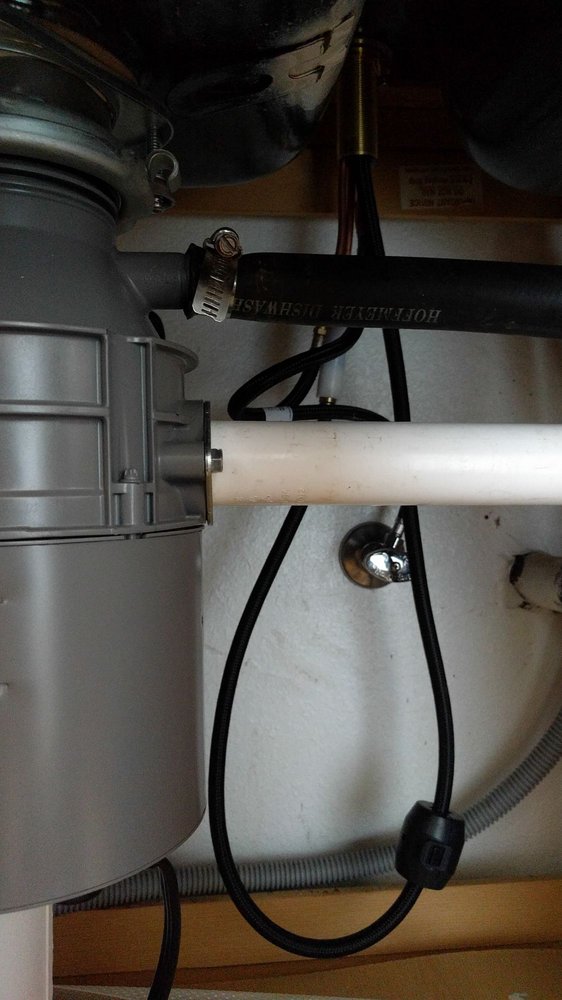 Garbage disposal and dishwasher drain connection under a sink